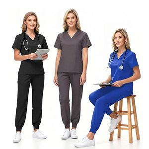 เสื้อกาวน์แพทย์แบบคลาสสิกสีขาว ผ้าฝ้าย ยูนิเซ็กซ์ สำหรับบุคลากรทางการแพทย์และพยาบาล พร้อมคุณสมบัติตรวจจับเข็มและเย็บต่อผ้าแบบไร้รอยต่อ - Product Image 1