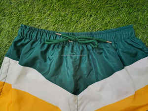 กางเกงว่ายน้ำขาสั้นผู้ชายกางเกงขาสั้นผ้าไนลอน100% เอวยางยืดน้ำหนักเบาสไตล์สตรีทสีพื้น - Product Image 6