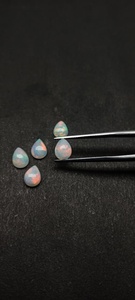 Ópalos Blancos Naturales Etíopes de Alta Luminosidad, Forma de Pera Lisa, Cabujones de 7*9 mm, Oferta al por Mayor a Precio de Mayoreo, Compre Joyería en Línea - Product Image 3