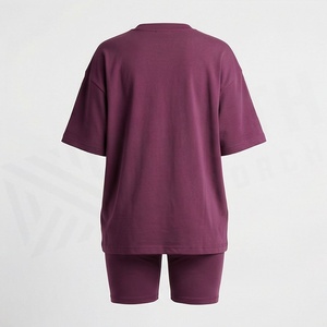 Ensemble sportif 2 pièces pour femme, couleur unie, t-shirt à manches courtes et short au-dessus du genou, coupe ample, col rond, design embossé - Product Image 2