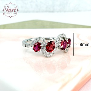 แหวนเพชรพลอยรูปไข่สีแดงทับทิมจาก [เชอรี จิวเวลส์] ทองคำขาวแท้ 18K ประดับด้วยทับทิมรูปไข่ธรรมชาติและเพชรทรงกลมเจียระไนแบบเหลี่ยมสำหรับผู้หญิง - Product Image 2