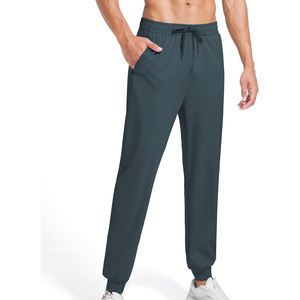 Pantalon de sport conçu pour les séances d'entraînement, avec tissu extensible, surface lisse, taille ajustée et maintien sécurisé. - Product Image 1