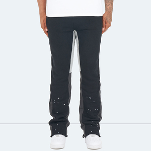 Pantalon de survêtement en molleton noir pour homme avec panneau latéral gris et motif à pois, tenue décontractée pour l'automne - Product Image 1