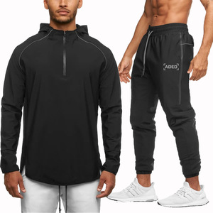 Pantalon de jogging noir pour homme à séchage rapide avec boucle porte-serviette, taille élastique, poches latérales, coupe décontractée longueur pleine pour l'été - Product Image 1