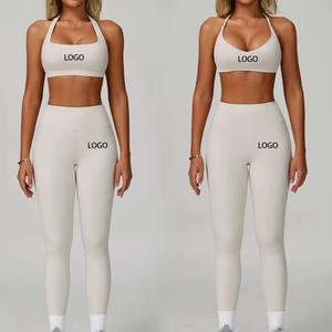 Top deportivo elástico y suave para mujer, corto por delante, con logo, liso, para fitness, yoga, sexy, acolchado, conjunto de gimnasio, sin espalda, transpirable, de corte alto. - Product Image 4