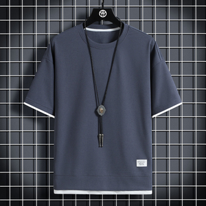 เสื้อยืดแขนสั้นผู้ชายสีดำทรงปกติ ผ้าถัก คอกลม พิมพ์ลายโลโก้ด้านหน้า สไตล์สปอร์ต ลำลอง ระบายอากาศได้ดี ผลิตจากโพลีเอสเตอร์ - Product Image 4
