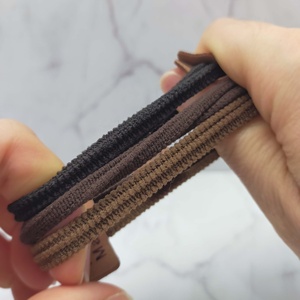 Élastiques à Cheveux Haut de Gamme pour Femme, Bandeau en Caoutchouc au Tempérament Simple avec Étiquette en Cuir, Serre-Tête Durable et Corde à Cheveux à Haute Élasticité - Product Image 5