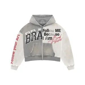 Sudadera con capucha corta con cremallera y tachuelas en gris y blanco Follow Me Because I Am |   Chaqueta Oversize con Estampado Gráfico Estilo Urbano |   Ropa Personalizada OEM - Product Image 1