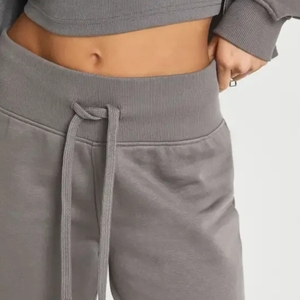 Pantalon de survêtement zippé pour homme, coupe oversize, couleur claire, noir uni, personnalisable, haute qualité, style sportif - Product Image 3