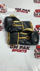 Gants de boxe professionnels - Gants d'entraînement et de sparring en cuir de qualité supérieure - Mittons de frappe Muay Thai or et noir - Product Image 3