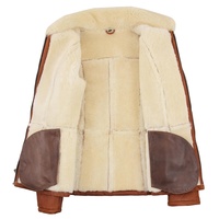 Manteau en fausse fourrure en peau de mouton blanc mi-long pour femme Veste en cuir de mouton Broderie Col montant Vestes en fourrure d'hiver