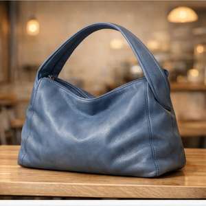 Le sac à main en cuir noir ressemble aux styles des collections de détaillants tels que Pakistan Bag. - Product Image 4