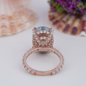 Luxury Women's Rose Gold Plated 925 Sterling Silver Oval Cut 6*8mm 5A Light Blue Moissanite Engagement Ring - Product Image 3