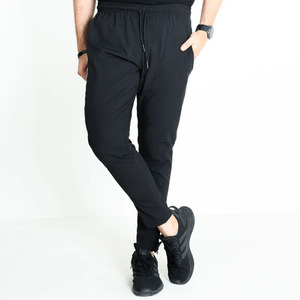 Pantalones largos de forro polar grueso con múltiples bolsillos, pantalones de algodón extragrandes para hombre, 100% poliéster de alta resistencia. - Product Image 2