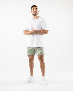 กางเกงขาสั้นกีฬาผู้ชายสีเขียวอ่อน ผ้าตาข่าย ระบายอากาศ แห้งเร็ว เหมาะสำหรับออกกำลังกาย วิ่ง และเล่นกีฬา ผลิตจากโพลีเอสเตอร์ 100% - Product Image 6