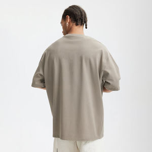 เสื้อยืดโอเวอร์ไซส์ผ้าคอตตอนหนานุ่ม 100% สไตล์สตรีทแวร์ คอกลม แต่งลายกราฟิกโลโก้ OEM ตามสั่ง - Product Image 5