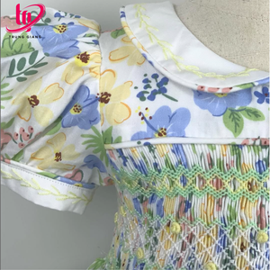 ชุดเดรสเด็กผู้หญิงแบบสม็อคขายส่ง ผ้าฝ้ายเนื้อนุ่มลายดอกไม้ เสื้อผ้าเด็กสั่งทำพิเศษจากโรงงานผลิตเสื้อผ้าเด็กในเวียดนาม - Product Image 3