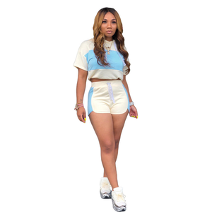 Conjunto de 2 piezas para mujer con bloques de color: Top corto deportivo y shorts de ciclista, atuendo de verano con cuello redondo y manga corta de punto de elastano y poliéster. - Product Image 5