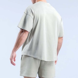 เสื้อยืดคอกลมแขนสั้นทรงโอเวอร์ไซส์สีพื้นผ้าฝ้ายสำหรับผู้ชาย รุ่นเรกูลาร์ ลองธ์  2026 - Product Image 3