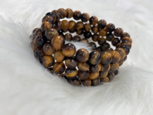 สร้อยข้อมือหินไทเกอร์อายธรรมชาติขนาด 8 มม. คุณภาพพรีเมียม ขัดเงาอย่างดี สร้อยข้อมือลูกปัดอัญมณี ขายส่งจำนวนมาก ของขวัญเครื่องประดับคริสตัล - Product Image 6