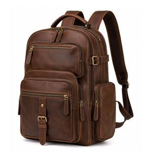 Sac à dos vintage en cuir véritable, spacieux, avec compartiment pour ordinateur portable, bretelles réglables, pour le travail, l'université, les voyages et les activités de plein air - Product Image 1