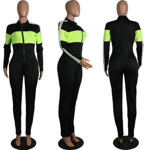 Combinaison longue à manches longues pour femme, noire et vert néon, à blocs de couleur, taille haute, coupe ajustée, fermeture éclair sur le devant, en Spandex et Polyester, style moderne - Product Image 1