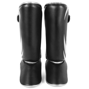 Protège-tibias en cuir PU noir avec fermeture auto-agrippante pour la protection sportive des adultes, design léger - Product Image 3