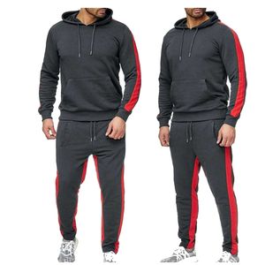Ensemble survêtement décontracté en molleton français pour homme, avec sweat à capuche et pantalon de jogging à rayures noires et rouges, idéal pour l'automne et la mode streetwear. - Product Image 1