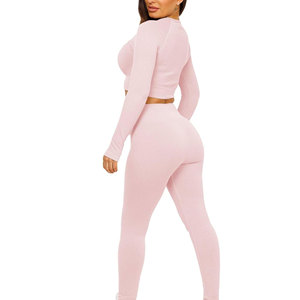 Pink Ribbed Solid 2 Piece Yoga Set Crew Neck Long Sleeve Crop Top High Waist Full Length Leggings Activewear Seamless - Product Image 1