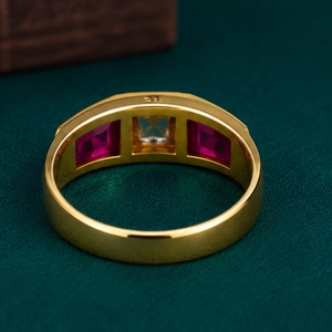 22K Gold Band Ring for Men Featuring a Central Round Brilliant Solitaire and Two Ruby Red Baguette Gemstones - Product Image 3
