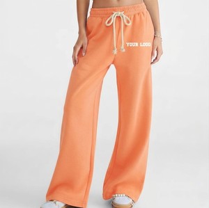 Pantalon de survêtement en molleton orange de haute qualité pour femme, coupe large, taille haute, avec cordon de serrage, décontracté, longueur intégrale, avec logo imprimé - Product Image 1