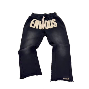 Pantalon de survêtement évasé noir pour homme, taille élastique avec cordon de serrage, imprimé lettres, style décontracté tricoté pour l'automne - Product Image 1