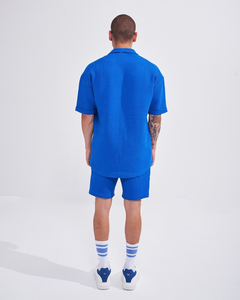 ชุดเซ็ตเสื้อยืดแขนสั้นกางเกงขาสั้นลำลองสำหรับผู้ชายรุ่นใหม่ขายส่งสำหรับฤดูร้อน ชุดลำลองสีพื้น ชุดเซ็ตเสื้อผ้าแบรนด์ดังสำหรับผู้ชาย ชุด 2 ชิ้น - Product Image 3