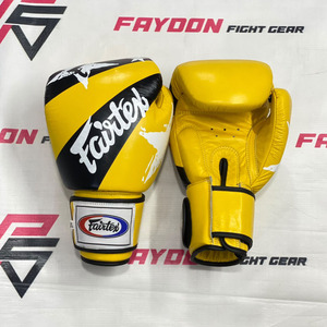 นวมชกมวยไทย Fairtex BGV1 Nation สีเหลือง/ดำ หนังแท้ สำหรับมวยไทยและคิกบ็อกซิ่ง แบบรัดสาย ระดับมืออาชีพ - Product Image 1