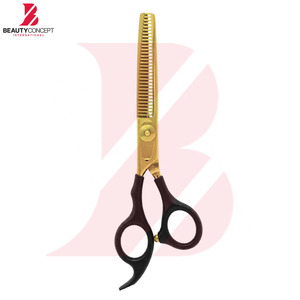 Últimas tijeras profesionales de peluquería con hoja chapada en oro y mango de plástico negro para texturizar el cabello - Product Image 4