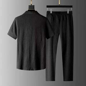 Ensemble de survêtement décontracté pour homme, noir, à manches courtes, col boutonné, couleur unie, en coton léger, coupe classique, idéal pour l'été - Product Image 2