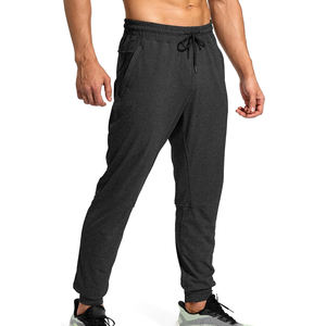 Pantalones deportivos modernos de corte ajustado para hombre con puños en los tobillos y cintura ajustable con cordón para un ajuste y sensación personalizados para uso diario. - Product Image 6