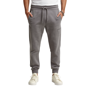 Pantalon de jogging pour homme vintage délavé avec finition acide usée et influence de la mode streetwear contemporaine - Product Image 1
