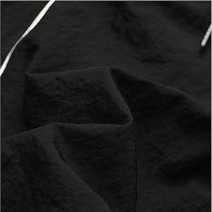 Pantalon de survêtement coupe ample et légère pour homme OEM, en nylon, avec taille élastique et cordon de serrage, idéal pour l'entraînement - Product Image 3