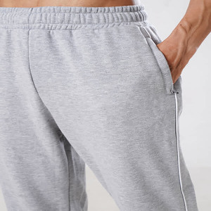 Pantalon de jogging décontracté en coton pour homme, taille élastique, idéal pour la gym, le fitness, l'entraînement sportif, le streetwear et comme pantalon de survêtement - Product Image 3