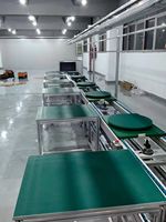 Ligne de convoyage à rouleaux par gravité multifonctionnelle sans alimentation, avec plateau tournant pour palettes, état neuf à bas prix
