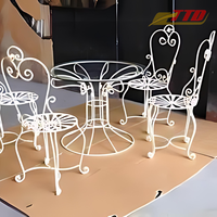 Ensemble de table en fer forgé moderne, meubles d'extérieur décoratifs avec chaises en fer pour les patios et les espaces de jardin