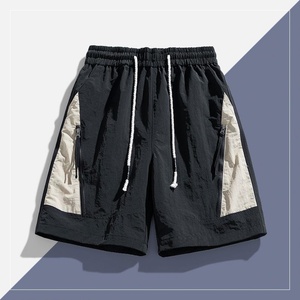 Nuevos shorts de hombre High Street con estilo, juveniles y a la moda, con cordón flotante, estampado de cinco puntos, esenciales, shorts americanos flocados. - Product Image 4