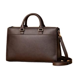 Bolso hobo de piel sintética azul marino con forma de media luna, un accesorio versátil con una silueta elegante y herrajes de latón. - Product Image 1