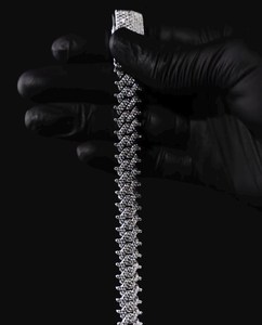 This luxury moissanite <b>bracelet</b> features a bold fully iced design with unique fishbone <b>inspired</b> links - Product Image 5