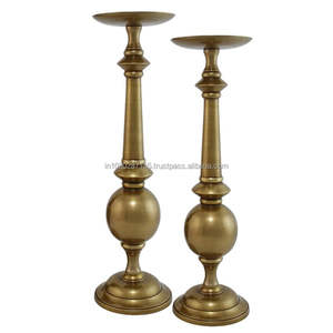 Decorative <b>tall</b> brass candle holder suitable for formal <b>table</b> settings religious festivals and vintage home accents - Product Image 1