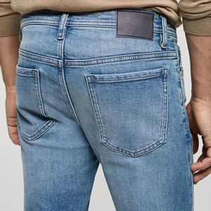 กางเกงยีนส์ผู้ชายทรงสูง ผ้าเดนิมยืด สีพื้น ขนาดกลาง สไตล์ลำลองสำหรับฤดูร้อน เหมาะสำหรับธุรกิจ ไซส์ใหญ่ ส่งออก กางเกงขายาว ติดกระดุม - Product Image 6