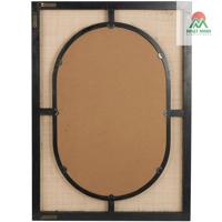 Miroir mural marron avec cadres noirs. Les miroirs, le rotin, le bois de pin et le bois MDF créent un look naturel et spirituel.