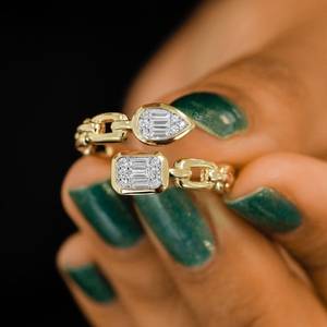 Anillo de compromiso de oro macizo chapado en rodio con diamante natural Toi Et Moi de 0.22 ct, engaste de doble punta y banda cruzada de eslabones cubanos - Product Image 1