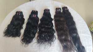 Extensions de cheveux humains indiens 100% naturels, ondulés, vierges, noirs naturels, doux et sans nœuds, pour la vente en gros et l'exportation - Product Image 4